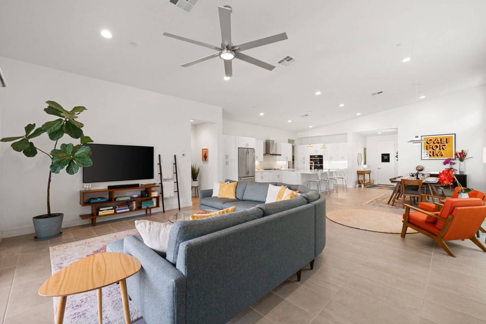Vibrant mid-century modern living with an airy, open-concept flow.