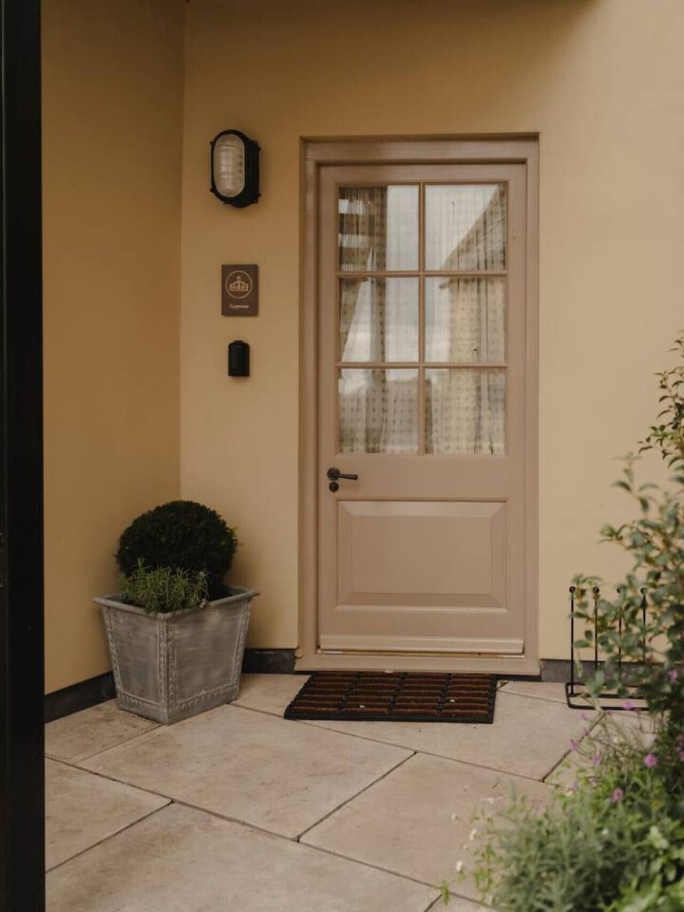 A private entrance set within a historic Cotswold building