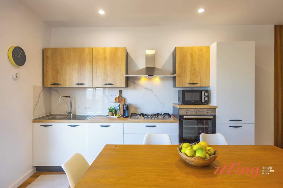 Fully Equipped Kitchen and Dinning Table