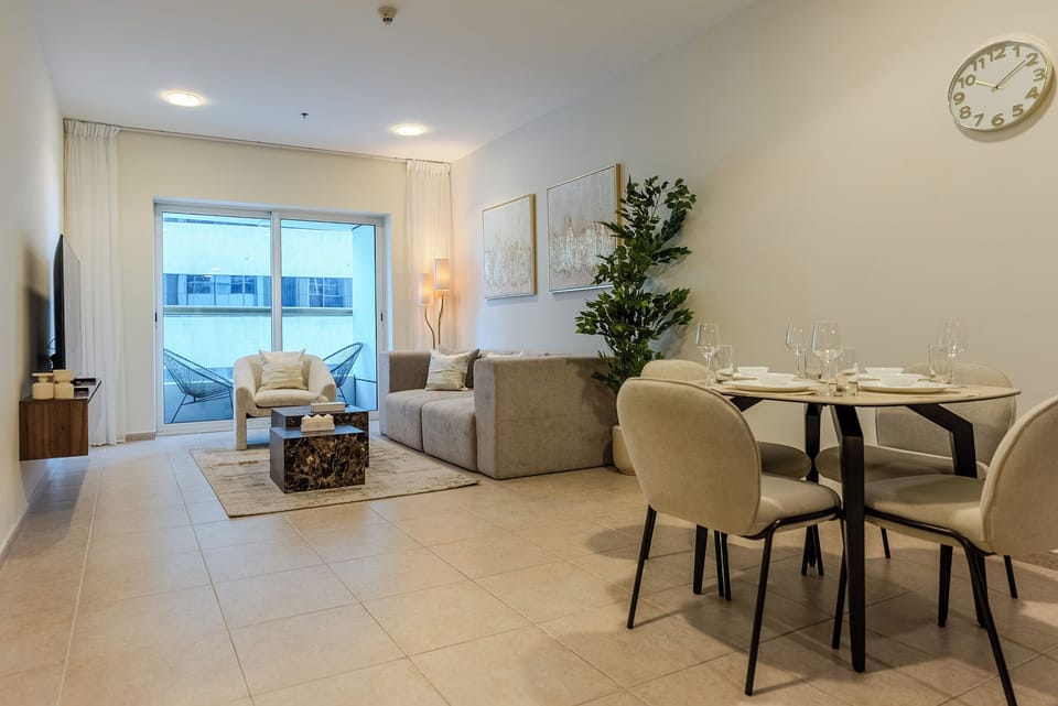 Deluxe Apartment, Balcony, City View | Living area | 55-inch Smart TV with digital channels