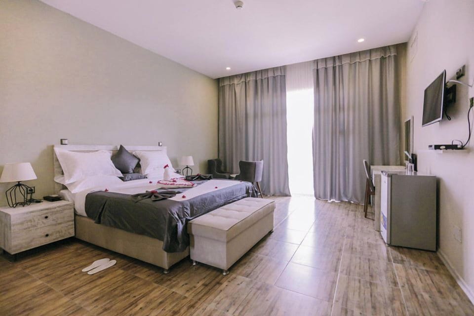 Standard Single Room, Balcony, Garden View | Iron/ironing board, free WiFi