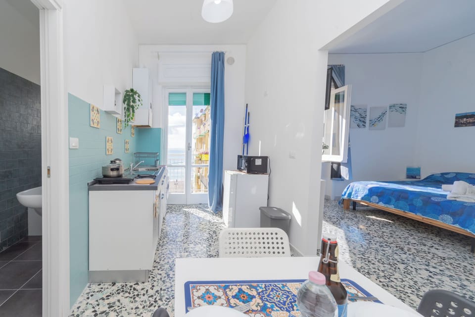 Comfort Apartment, Balcony, Sea View | Living area | Flat-screen TV