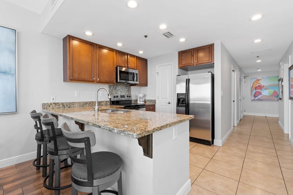 The open layout ensures that even while cooking, you're never far from the conversation—or the view.