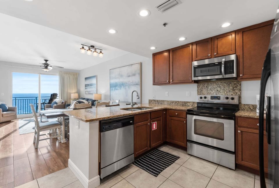 This stylish kitchen blends form and function with a modern, open-concept design that keeps you connected to the heart of the home.