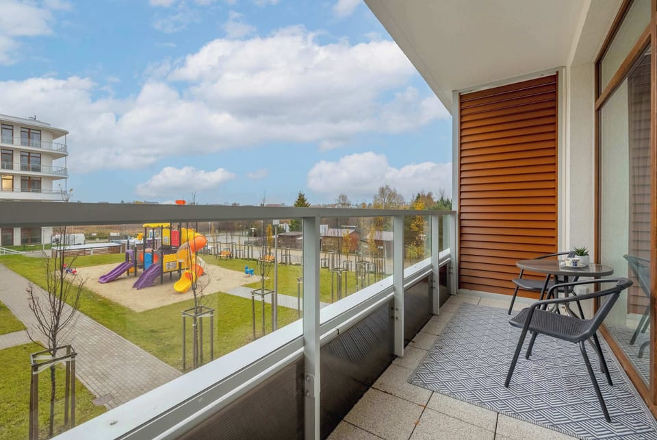Balcony with outdoor seating and a peaceful view
