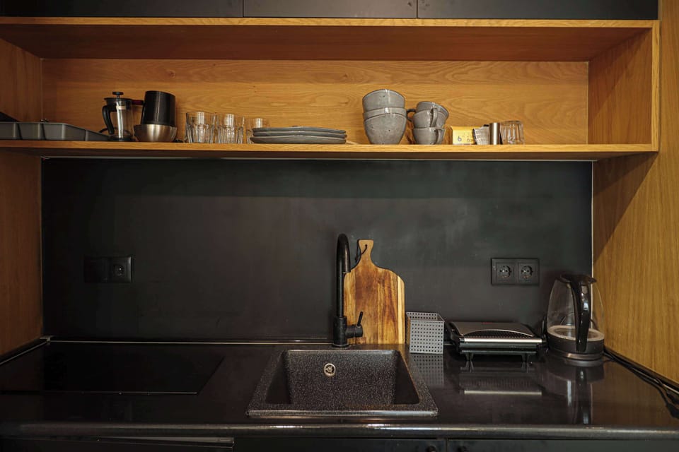 It also includes items like glasses, forks, knives, spoons, and various dishes!