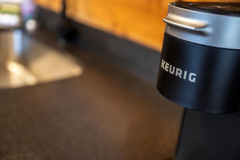 Mornings made easy with your own Keurig coffee bar—just steps from the sink and ready to brew before a day of mountain adventures.