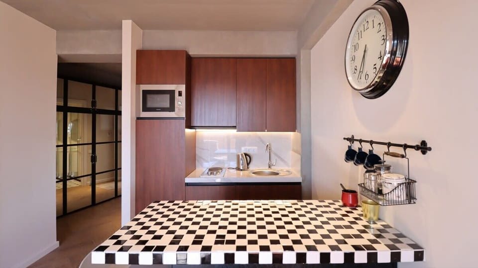 The kitchen is small but fully equipped for a short stay.