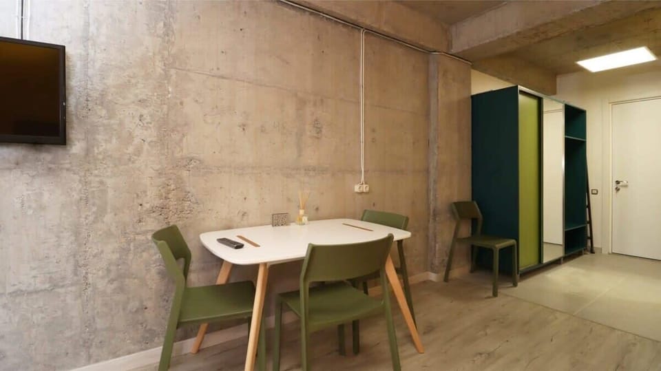 A cozy dining table perfect for sharing meals with friends!