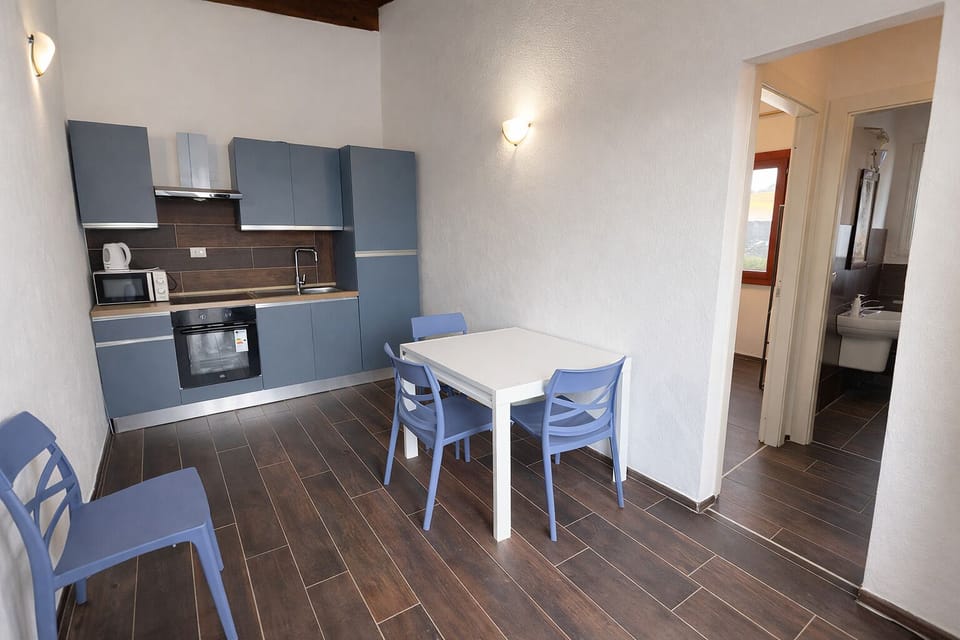 Condo, Sea View | Private kitchen | Fridge, microwave, oven, stovetop