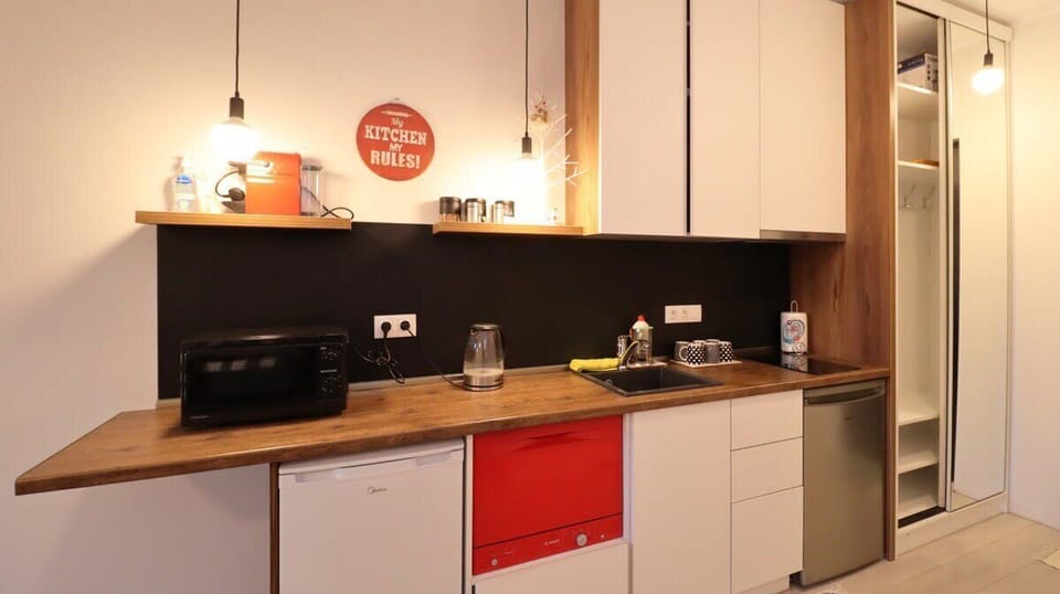 Whether you're crafting a quick snack or a full-course meal, the well-equipped kitchen with its contemporary appliances has everything you need.