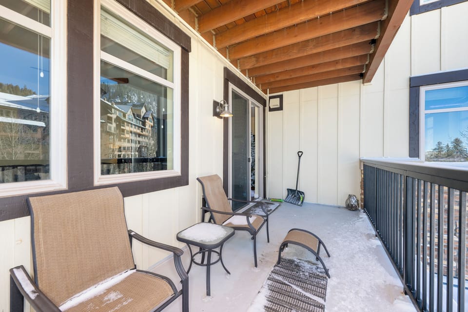 Your private balcony offers mountain air and cozy seating for morning coffee or evening relaxation.