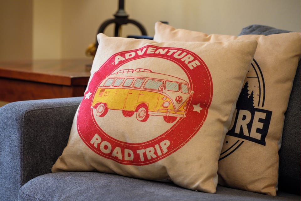 Sink into these cozy adventure-themed pillows and let your wanderlust dreams begin in this comfortable living space.