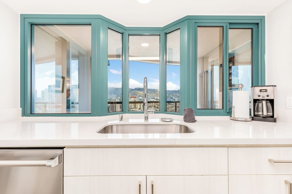 Window overlooking the balcony and mountain views