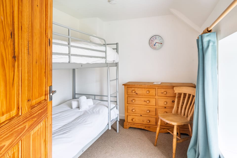 First floor: Bedroom three has 3' bunk beds