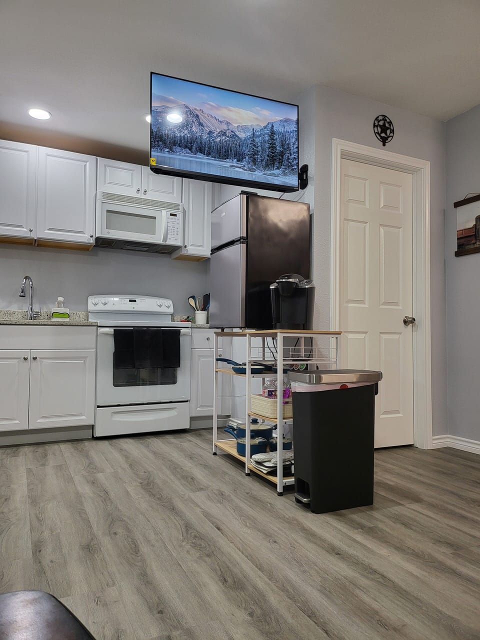 Tv swings out so you can watch from the couch or comfortably from the bunk beds