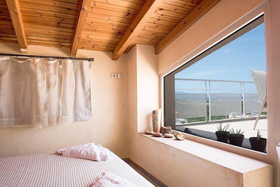 Cozy Bedroom with Panoramic Sea Vista