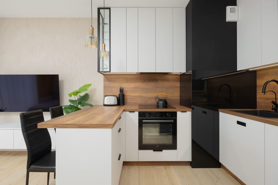 The fully equipped kitchenette includes everything you need for a home-cooked meal.