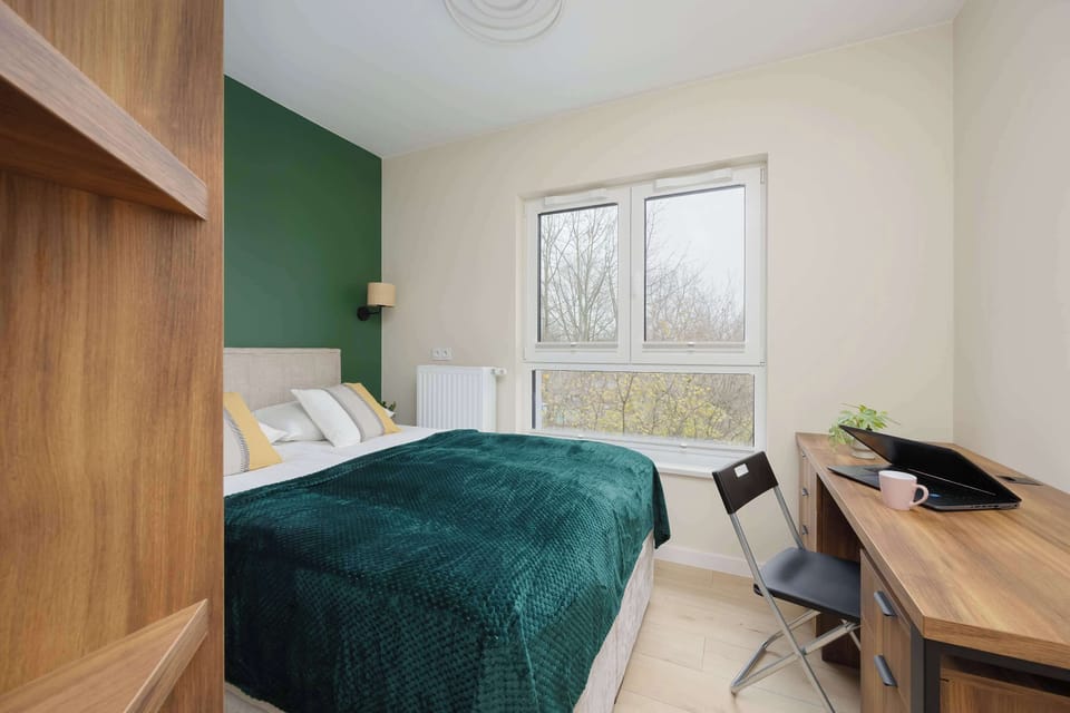 The bedroom features a luxurious double bed for a restful night's sleep.