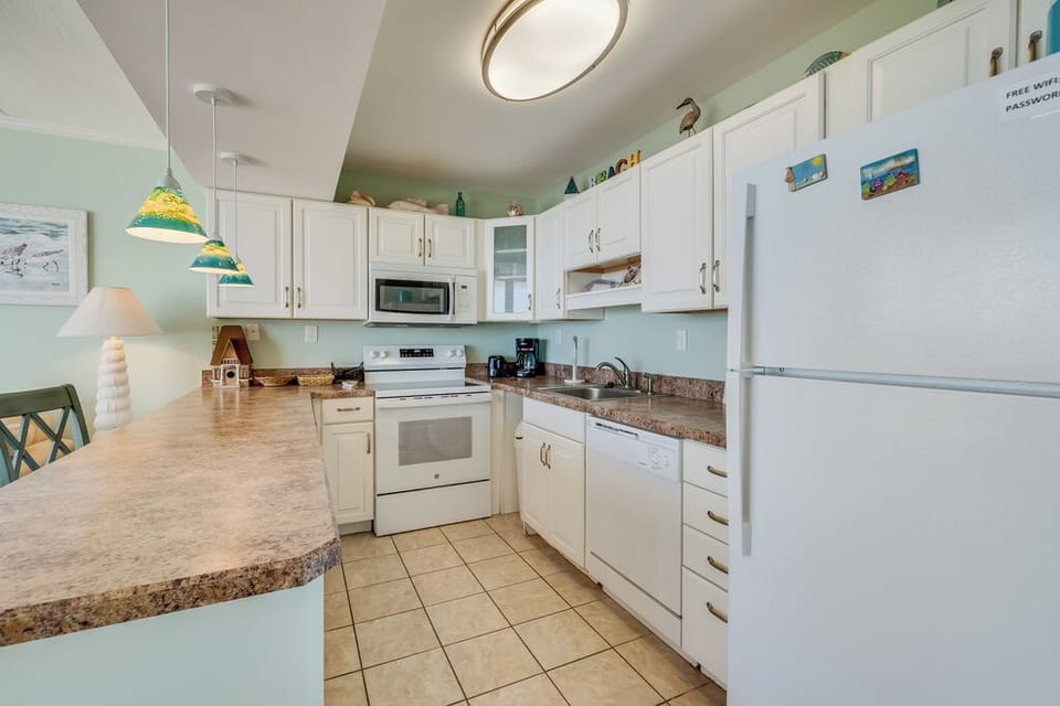 The Bright & Open Kitchen allows the Chef in your Family to Reconnect even while Preparing Meals.