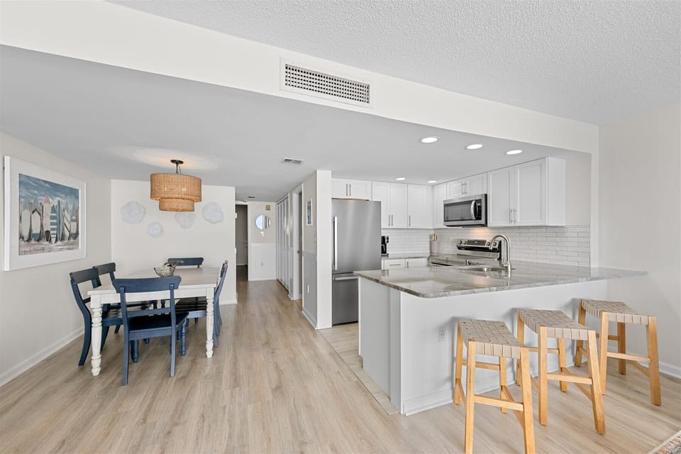 Just off the Living Area is the Kitchen and Dining Area.