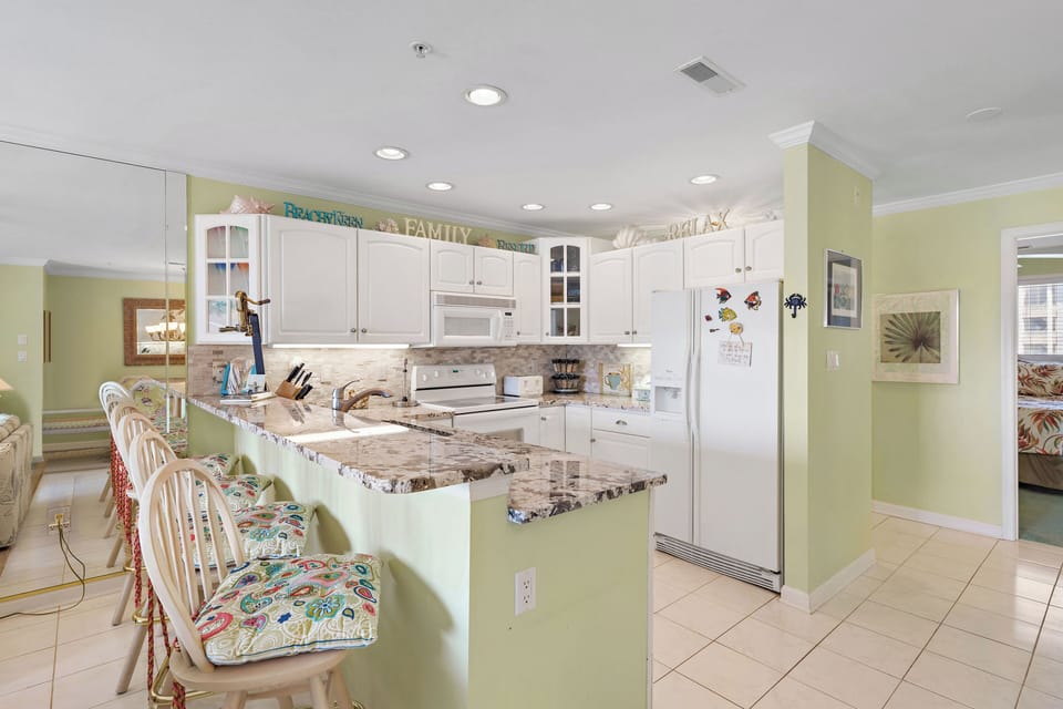 There's plenty of room for all at the Dining Table and at the Breakfast Bar.