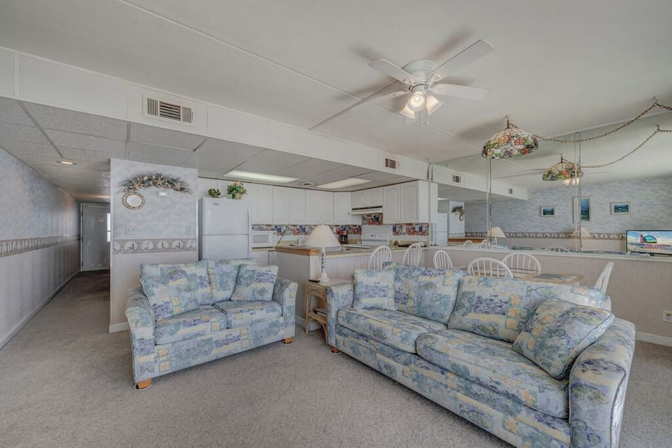 A charming Living Area with cozy furnishings.