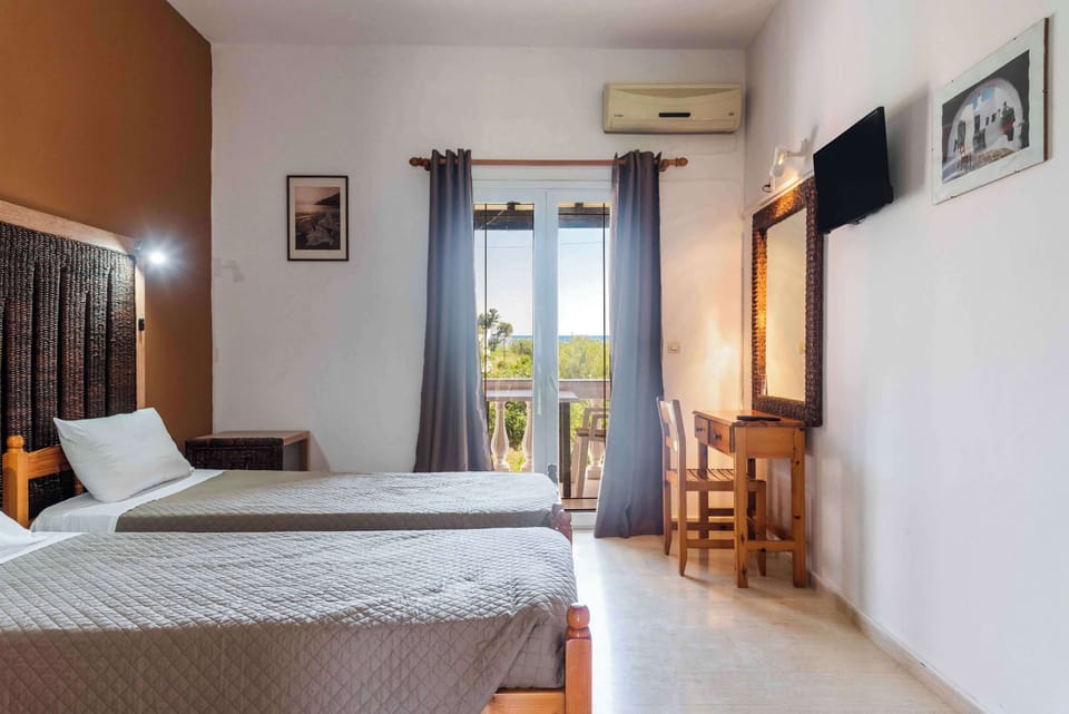 Sun-lit room with access to the outdoor area.