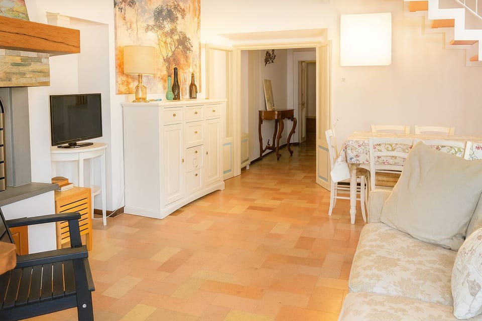 Apartment, Balcony, City View | Living area | 32-inch flat-screen TV with satellite channels