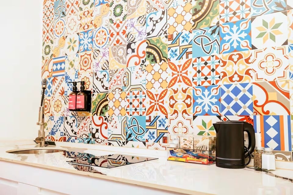 Cook a meal as vibrant and bold as your colorful kitchenette.