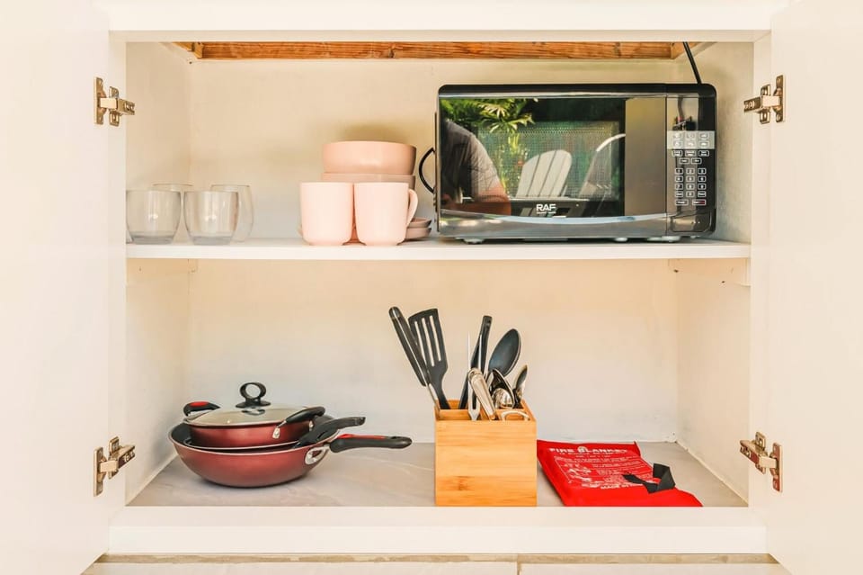 All essentials are ready for cooking and dining with ease.
