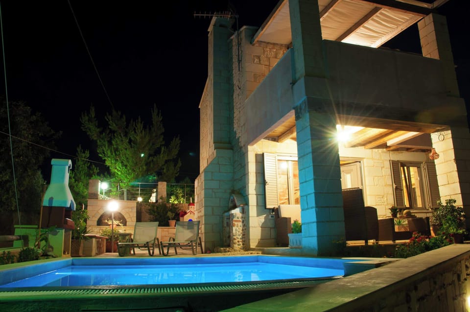 Secluded Pool Area Featuring BBQ and Seating