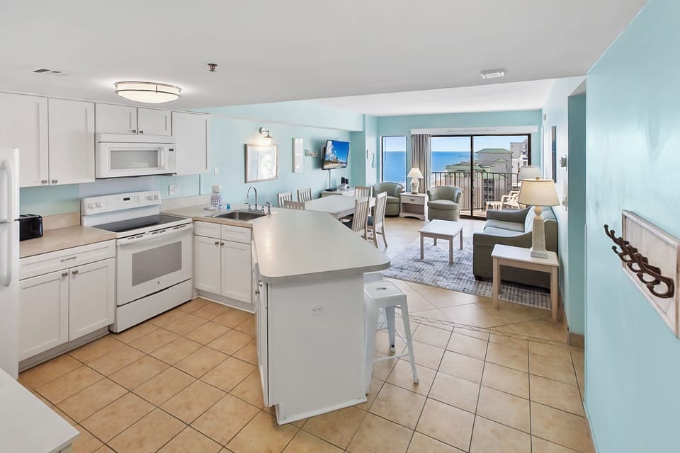 Open concept kitchen fully-equipped for all cooking needs