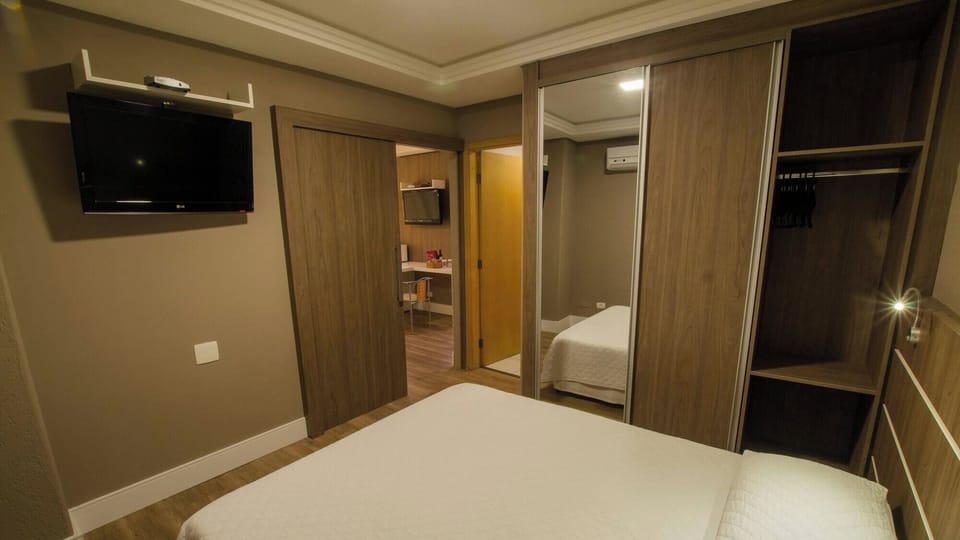 Organize effortlessly with generous wardrobe space and sleek finishes.