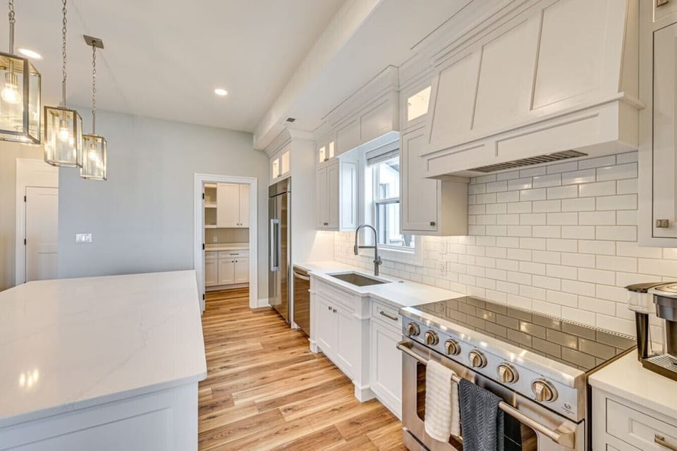 Bright Kitchen | Large Island with Seating | Pendant Lighting | Perfect for Casual Dining & Conversation