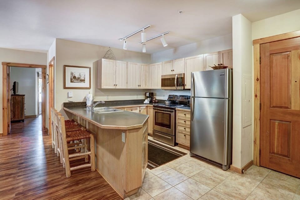 Experience the convenience of the fully equipped kitchen, offering everything needed to prepare meals while enjoying your stay.