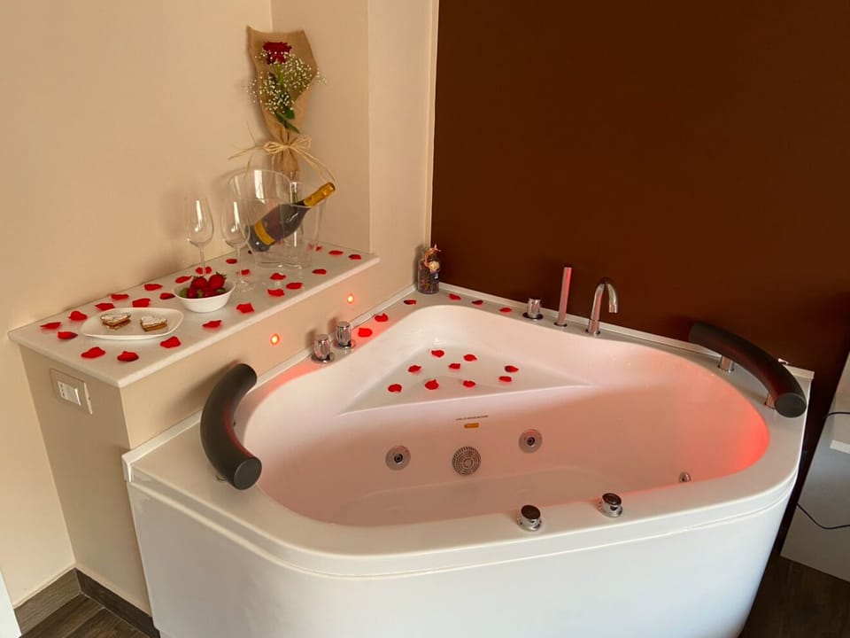 Suite, Balcony, City View | In-room safe, blackout drapes, iron/ironing board, free WiFi