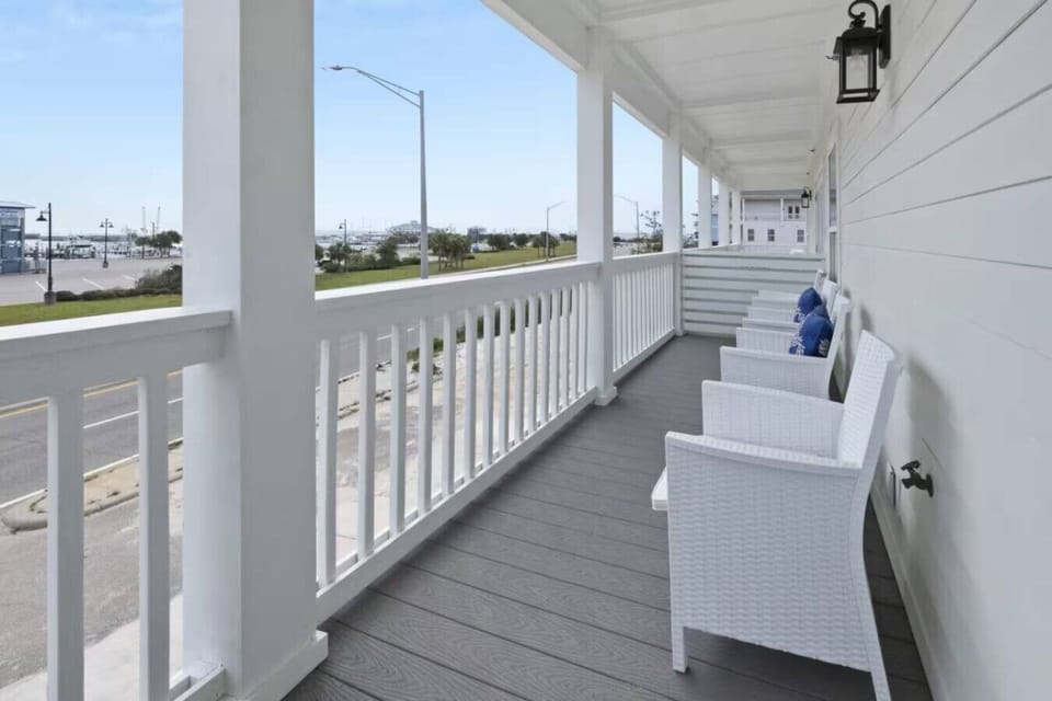 Scenic porch — Enjoy marina and beach views