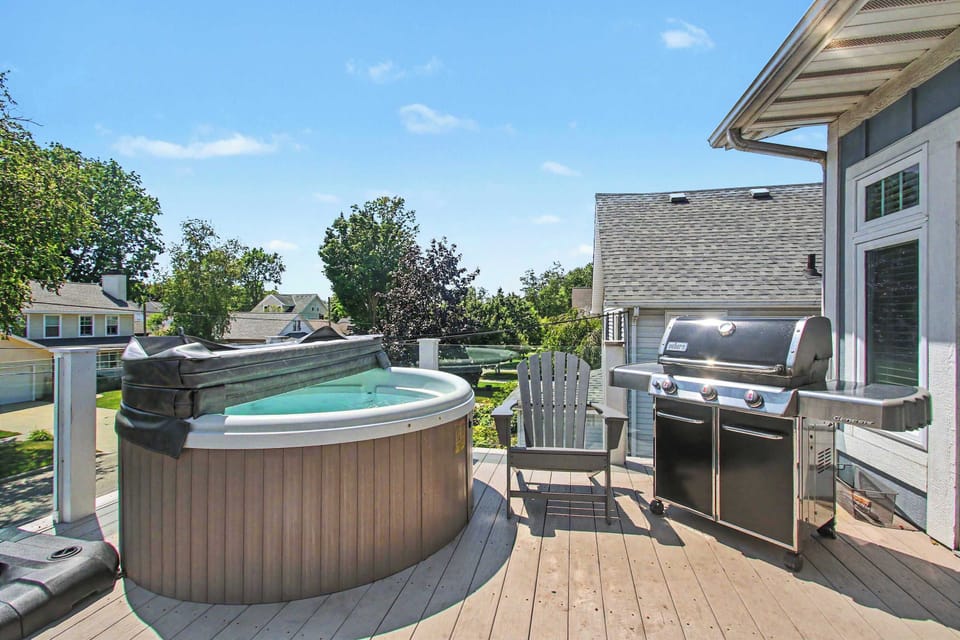 Soak your worries away in the private hot tub under the stars after a day at the beach.