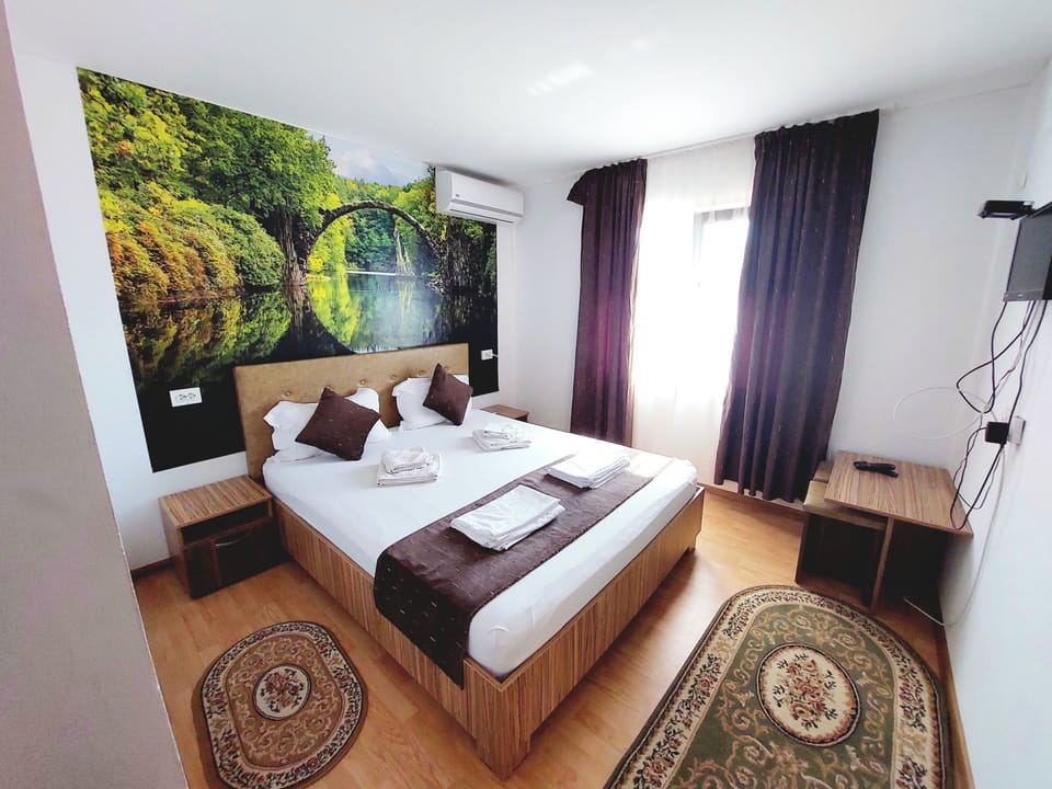 Double Room, Courtyard View | Hypo-allergenic bedding available, blackout drapes, soundproofing