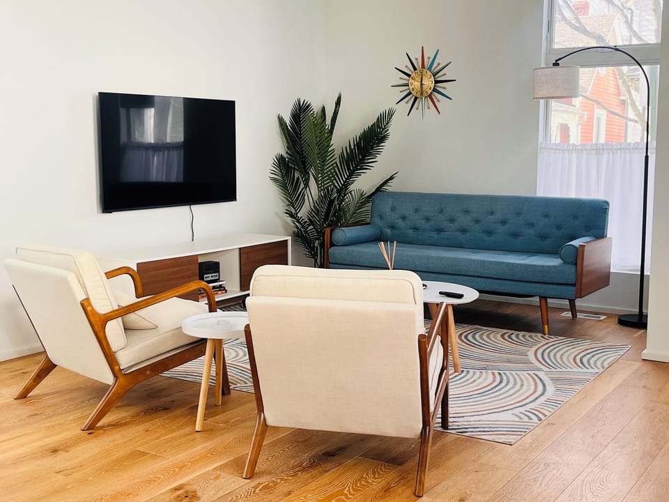 Cozy with a mid-modern design.  Great to relax & watch shows on large smart TV