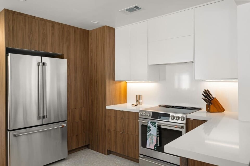 Stylish Fully-Equipped Kitchen Features Stainless Steel Appliances