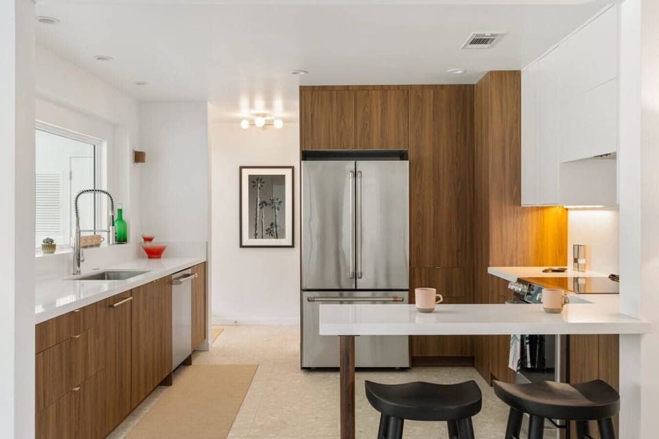 Stylish Fully-Equipped Kitchen Features Stainless Steel Appliances