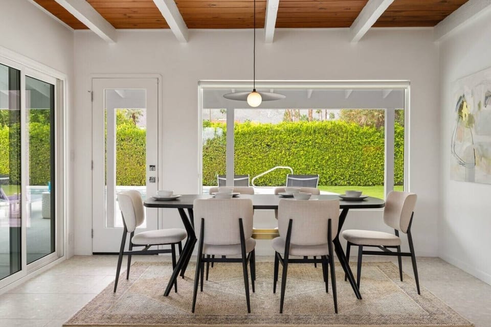 Formal Dining Room Seats Eight And Overlooks Pool