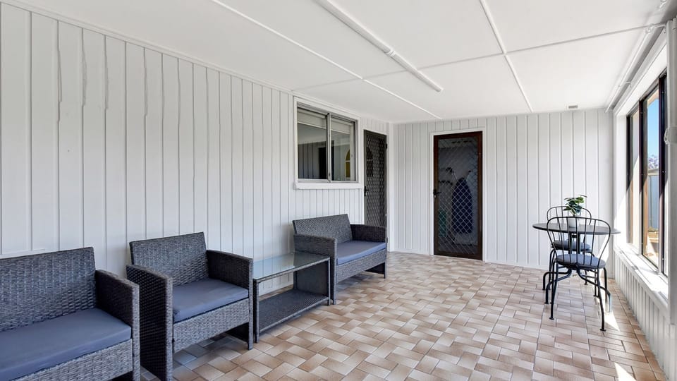Covered outdoor sitting space for relaxed downtime