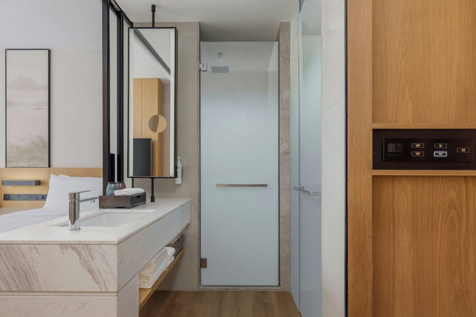 Shower, free toiletries, hair dryer, bathrobes