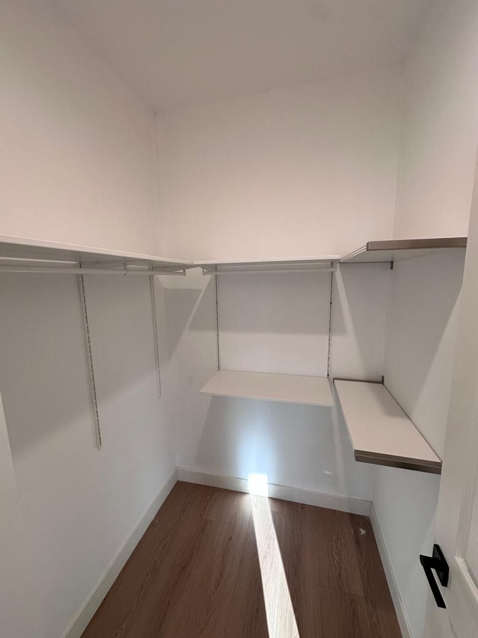 room for your luggage and attire in this spacious walk-in closet