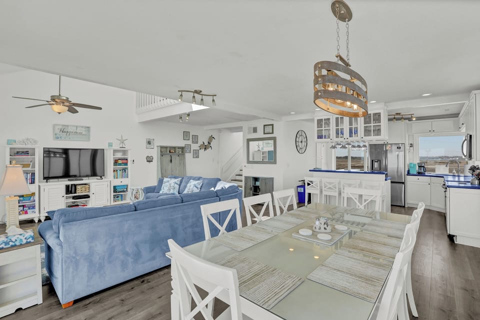Dining table with seating for 10 to keep family together enjoying meals and view