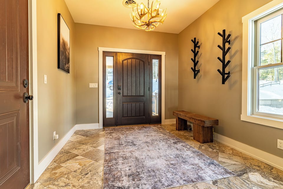 Front entrance with art deco coat rack