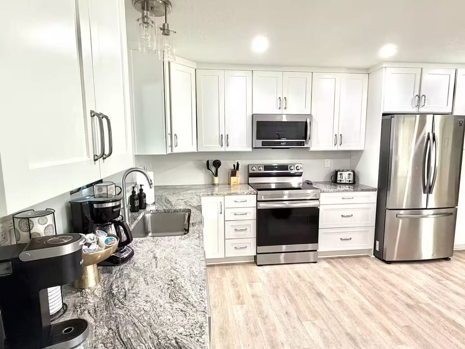 Fully stocked kitchen with coffee bar